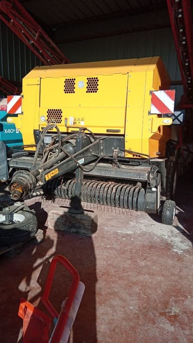 Presse balles rondes NEW HOLLAND BR 6090 - photo 5