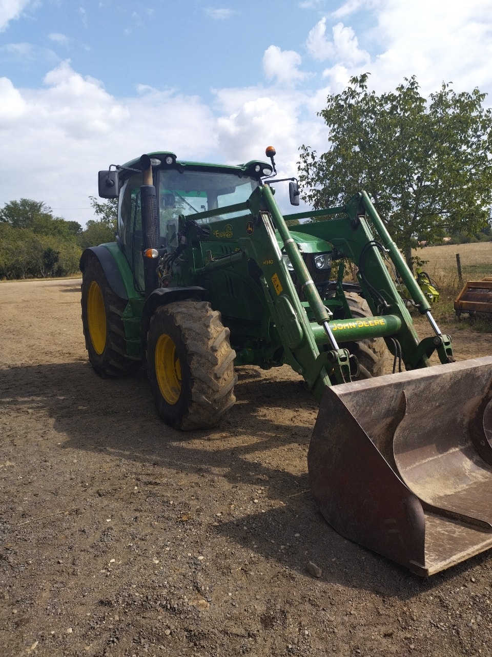 Tracteur chargeur JOHN DEERE 6115R - photo slide 5