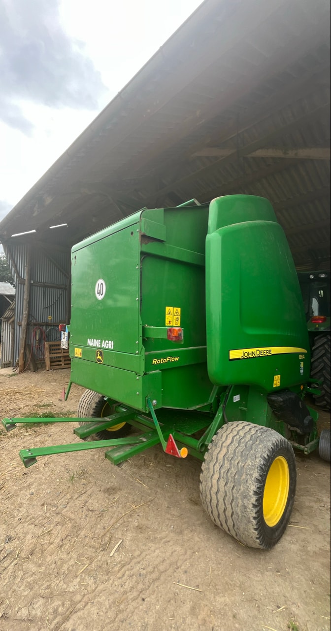 Presse balles rondes JOHN DEERE 864 - photo slide 4