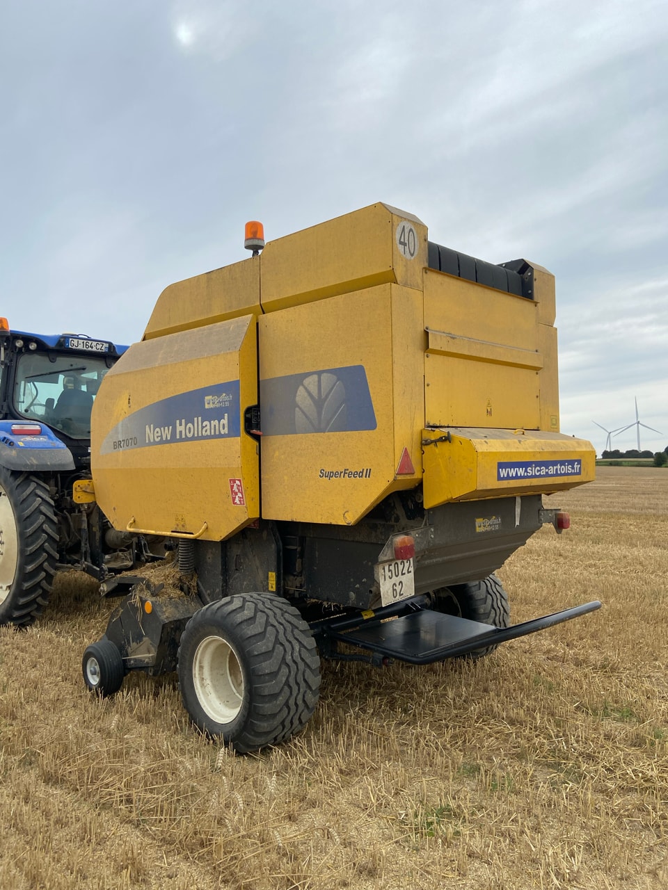Presse balles rondes NEW HOLLAND BR 7070 - photo slide 2