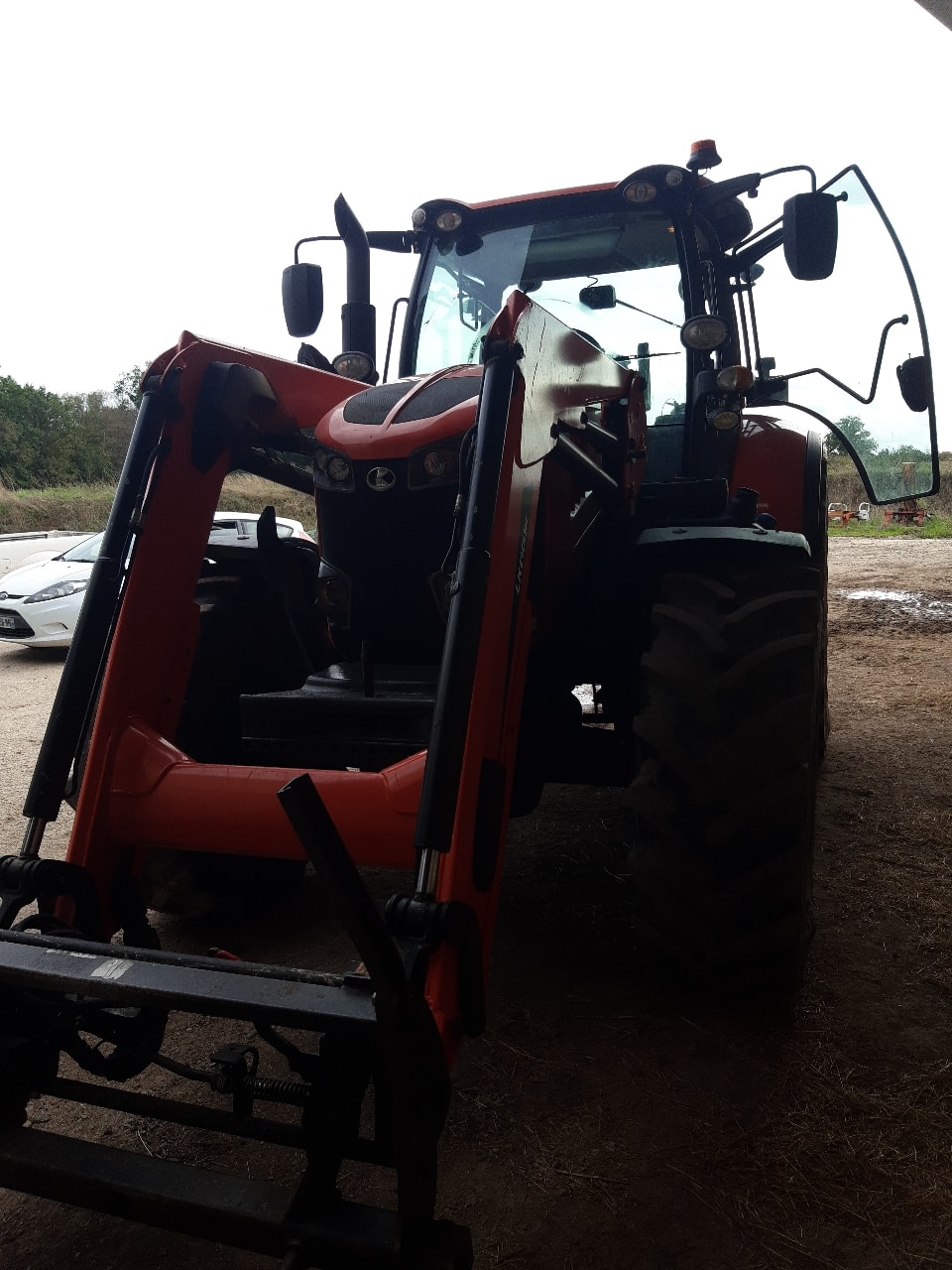 Tracteur chargeur KUBOTA M7-133 - photo slide 1