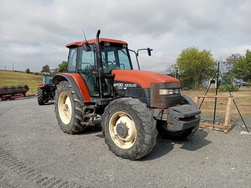 Tracteur NEW HOLLAND M100 - photo slide 2
