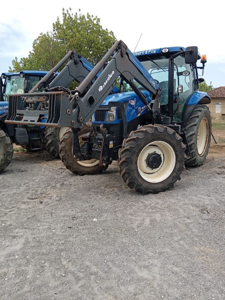 Tracteur chargeur NEW HOLLAND T 6.140 - photo slide 1