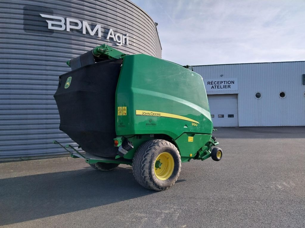 Presse balles rondes JOHN DEERE 990 - photo slide 1