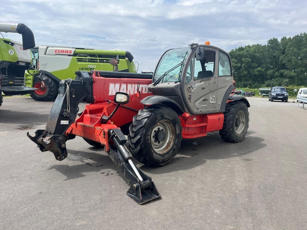 Telescopique MANITOU MT1440 - photo slide 3