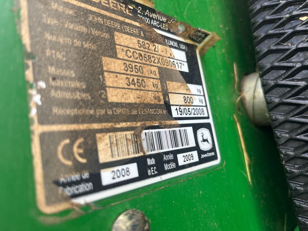Presse balles rondes JOHN DEERE 582 - photo slide 23