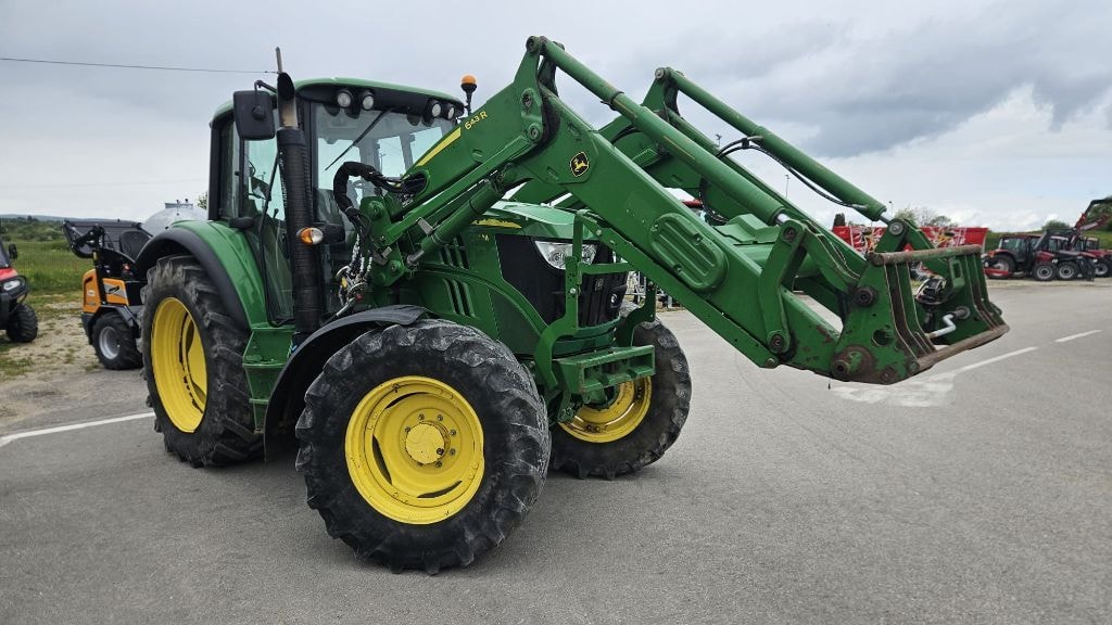 Tracteur chargeur JOHN DEERE 6115M - photo slide 2