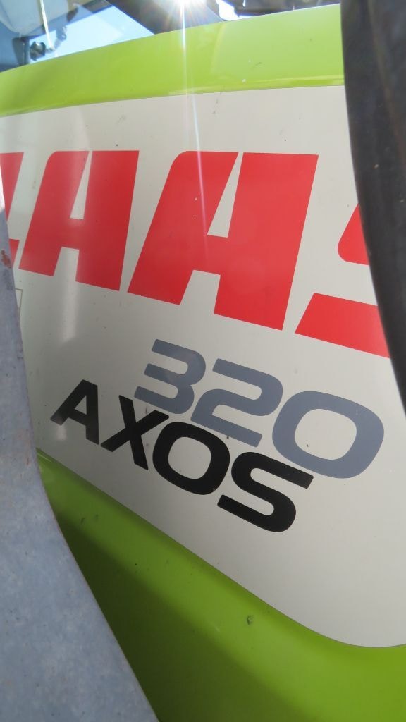 Tracteur chargeur CLAAS AXOS 320 CX  - photo slide 35