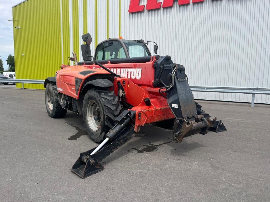Telescopique MANITOU MT1440 - photo slide 1