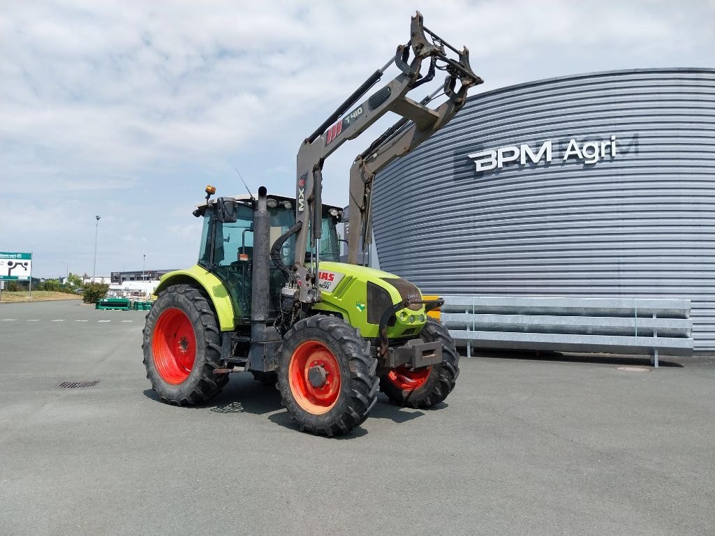 Tracteur chargeur CLAAS ARION 410 - photo slide 1