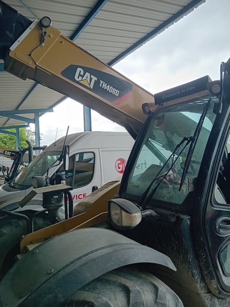 Telescopique CATERPILLAR TH 408 D - photo slide 7