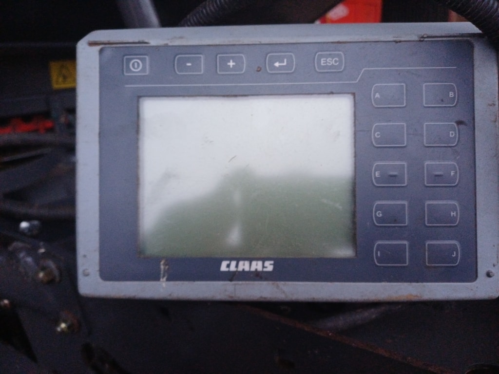 Presse balles rondes CLAAS 460 RF - photo slide 10