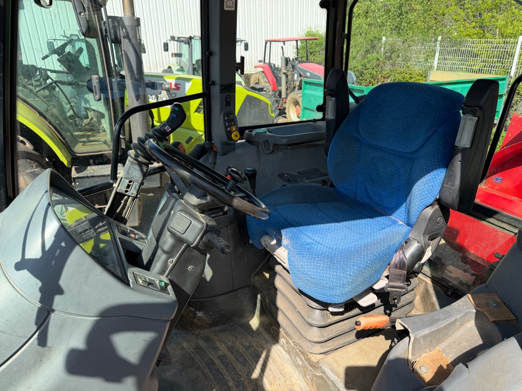 Tracteur chargeur NEW HOLLAND TS 100 - photo slide 9