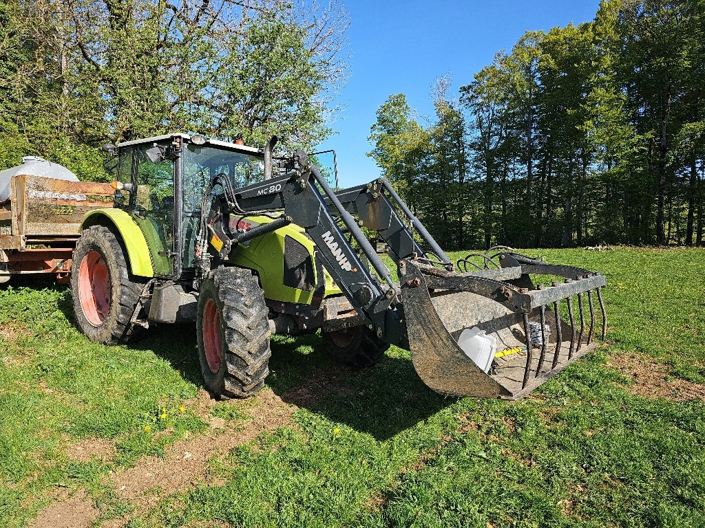 Tracteur chargeur CLAAS AXOS 320 - photo slide 1