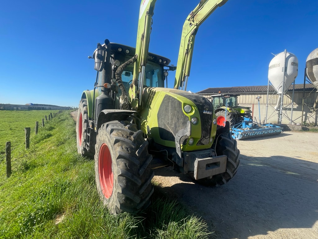Tracteur chargeur CLAAS Arion 610 - photo slide 1