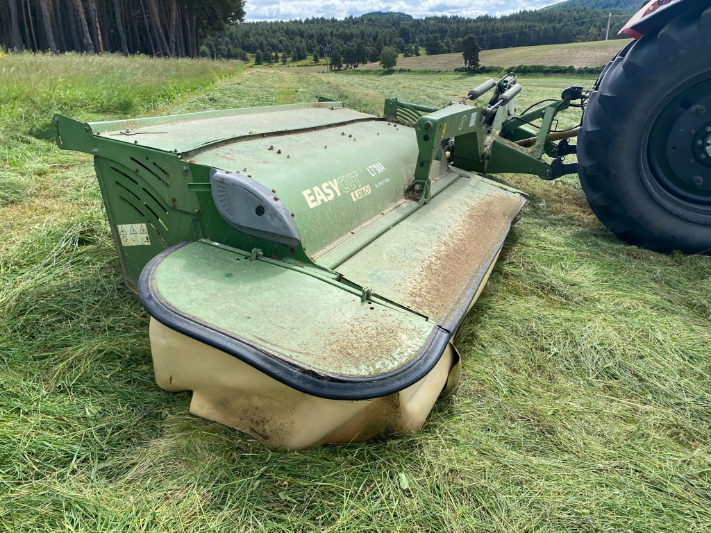 Faucheuse conditionneuse KRONE R 320 cv - photo slide 1