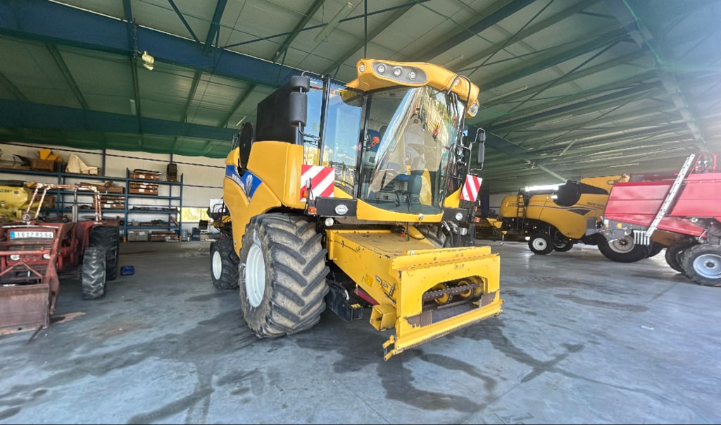 Moissonneuse NEW HOLLAND CX 5090 - photo slide 2