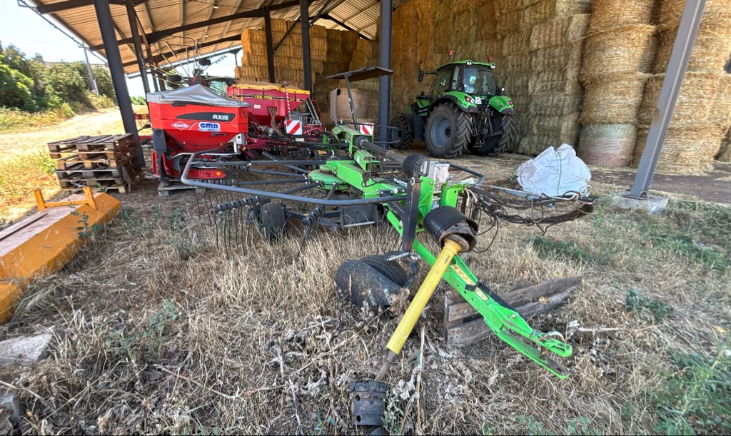 Andaineur DEUTZ FAHR Swathmaster 7132 vario - photo slide 1
