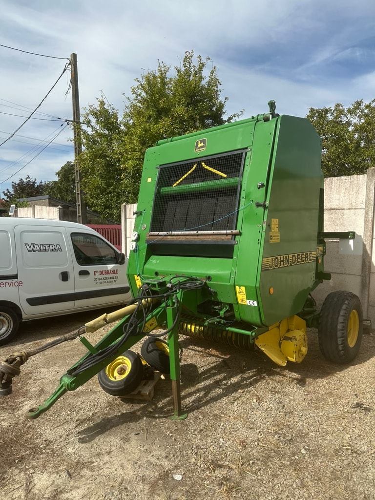 Presse balles rondes JOHN DEERE 580 - photo slide 2