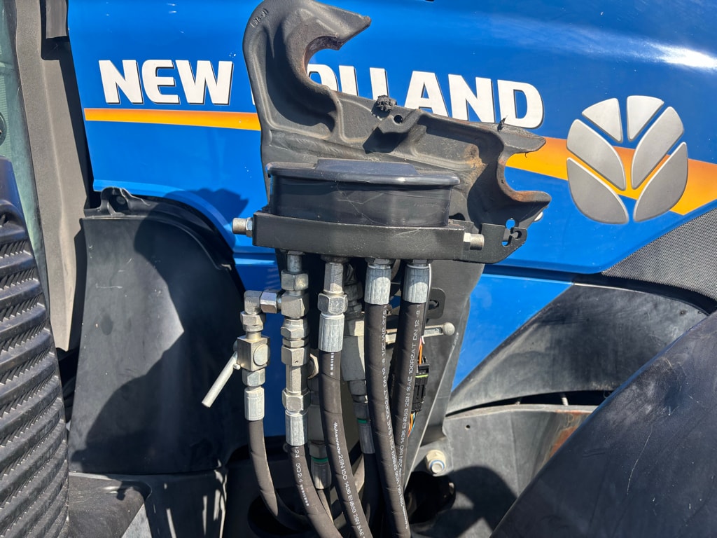 Tracteur chargeur NEW HOLLAND T6.165 - photo slide 9