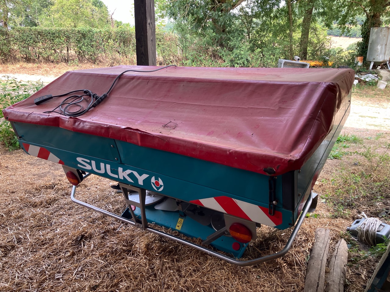 Epandeur engrais SULKY DX 20 + - photo slide 4
